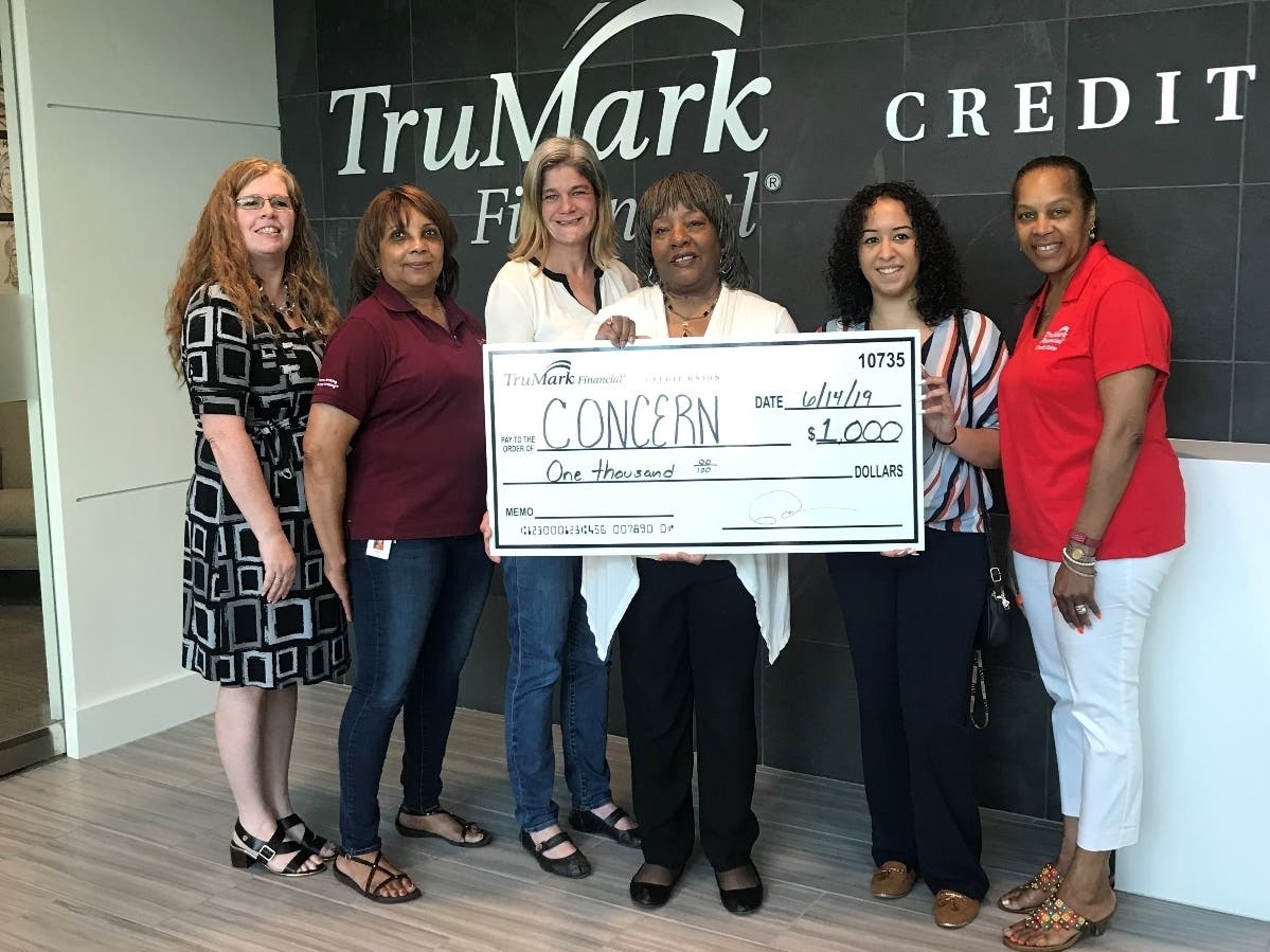 Credit union demonstrates "People Helping People®" philosophy Upper