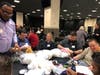 TruMark Financial employees participated in a Team Teddy Bear Rescue program organized by TeamBonding at the credit union’s annual meeting on Feb. 17. Employees assembled teddy bears that were donated to Turning Points for Children’s foster care program.