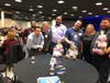 TruMark Financial employees proudly display teddy bears they assembled as part of a team building exercise at the credit union’s employee annual meeting on Feb. 17.  The teddy bears were donated to Turning Points for Children’s foster care program.
