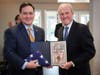 Macklin Wagner, representing Congressman Brian Fitzpatrick (left), presented a certificate and an American flag recognizing the credit union’s contributions to the community to Leonard V. Doughty lll, president of TruMark Financial’s board of directors.