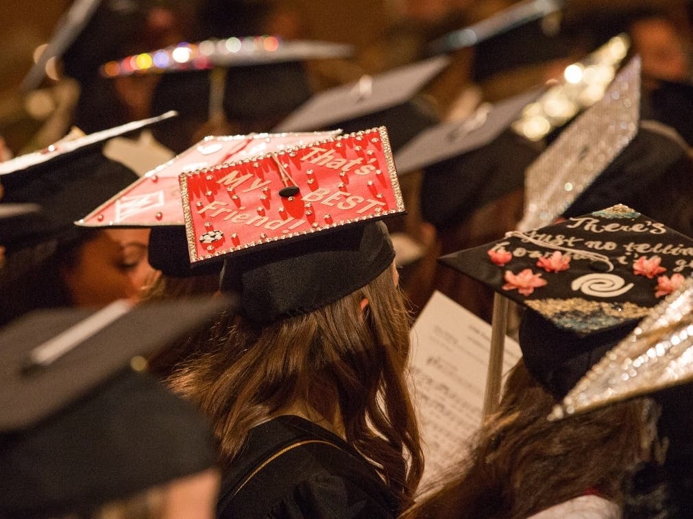 Students in their caps and gowns. 