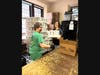 Inside the Ossining Food Pantry: (Left to Right) Volunteers Wendy Adair, Virginia Ferris