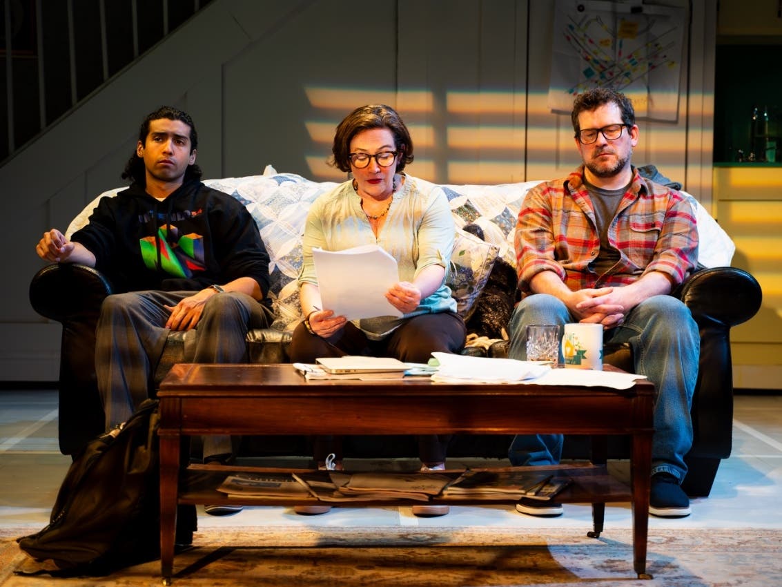 The fact-checker Jim Fingal (Edward Montoya) , the editor  Emily Penrose (Suzanne O’Donnell), and the writer  John D'AgaShannon Michael Wamser) debate the boundaries of creative nonfiction in “ “The Lifespan of a Fact” 