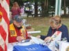 VA representative Raquei McComas help vet sign up for VA Healthcare