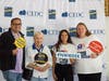 Left to right: Pedro Chavez, Mayor of Santa Paula, guest, Bianca Farmer, Victoria Brady at the Santa Paulan Apartments resource fair