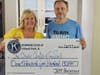 Matt Clarage of the Orland Park Kiwanis Club presents development director Lorri Nagle with a check of $1,500 for the Crisis Center for South Suburbia.