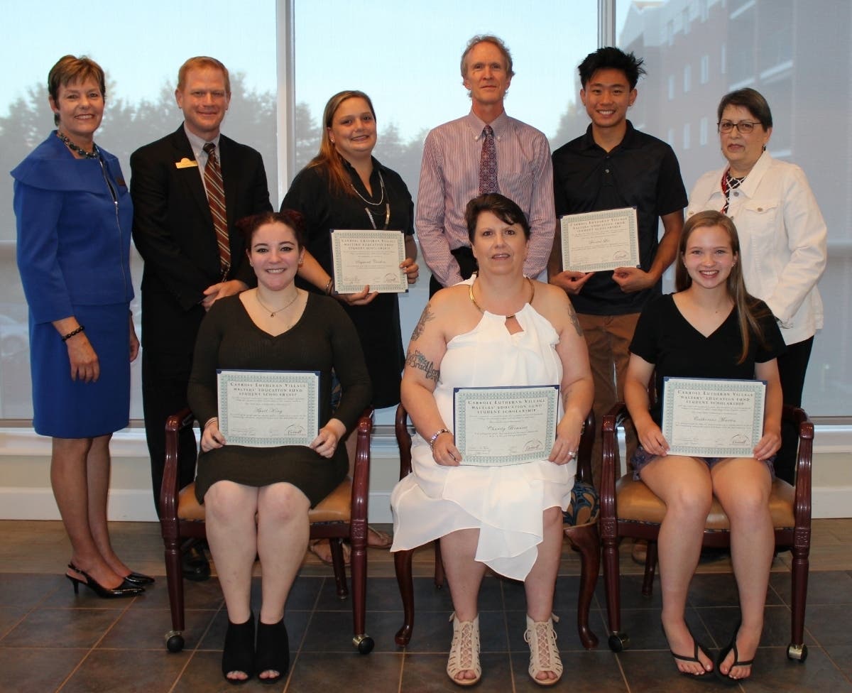 Front:  April King, Charity Bennett, Catherine Martin. Back: Vice President of Human Resources Suzy Dyer-Gear, President/CEO Jeff Branch, Sayword Cordon, Executive Director John Henry, Daniel Lui, Residents Association President Deborah Rio.