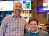 Brandt Gully, owner of The Springs Cinema & Taphouse, welcomes film star Zack Gottsagen to one of the theater’s private events Nov. 7. 