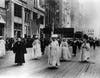 1917 Suffrage.Carrie Chapman Catt, center, in white, leads a group of suffragists in a New York City parade staged in 1917 to gain support for woman suffrage.  