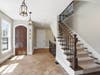 Elegant staircase offering a strong architectural focal point and seamless flow throughout the home.