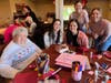 Traditions of Hanover resident Rosemarie Schadle makes a craft alongside speech-language pathology students from Moravian University, Lauren Kelley, Nicole Bull, Jess Mann, and Sarah Lombardo, during the residents' spa day.