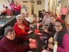Speech-language pathology students from Moravian University give mini manicures to residents of Traditions of Hanover. Pictured: Kathy Waldron, Vera Delhi, Pauline Beck & Rosemarie Schadle with students Aria Pant, Colleen Simonson, Jess Mann & Sam Forcht.