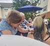 Traditions of Hanover residents interact with Equi-librium’s specially trained miniature horse, Star.