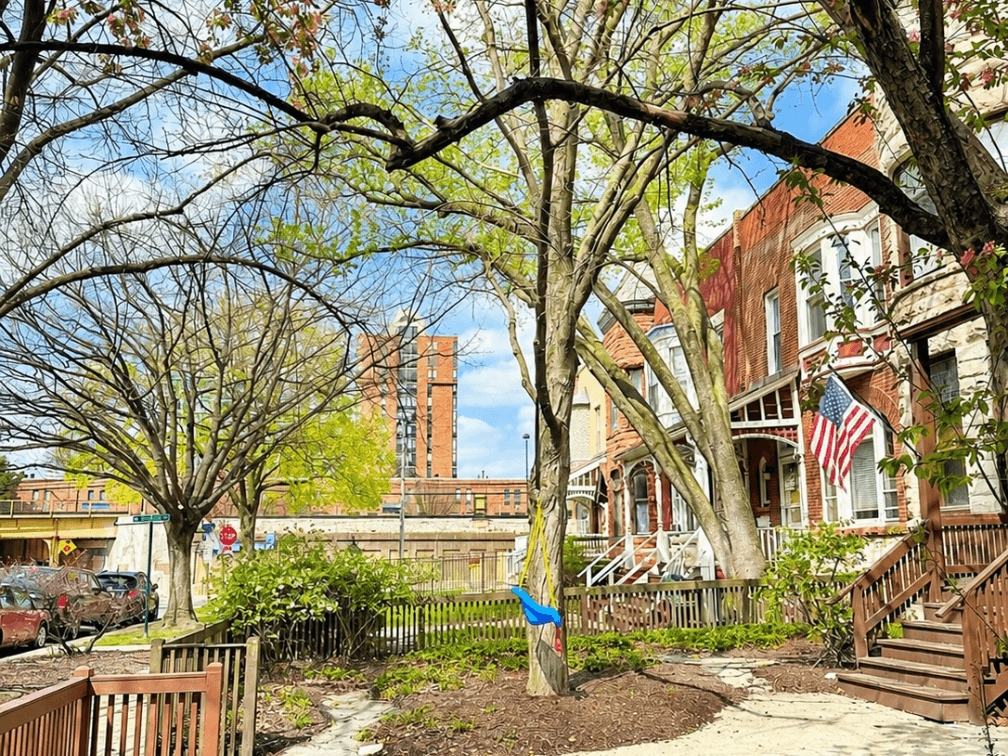 A spring view of Oak Park’s older homes, mature trees, and front-porch neighborhoods - the kind of local texture that can make deciding where to move next feel more complicated than simply selling a house.