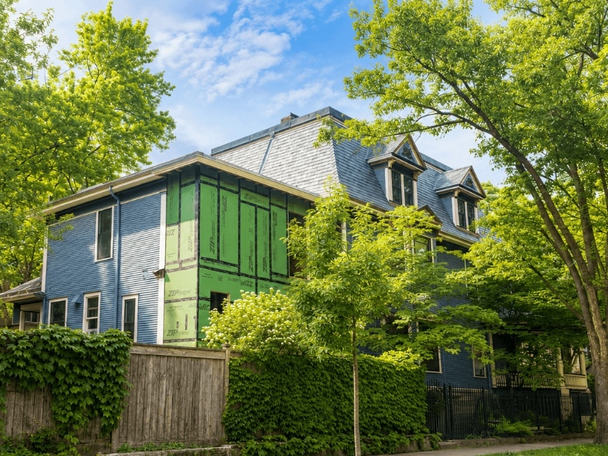 A home addition under construction in Oak Park, Illinois. Homeowners should consider costs, resale value, and whether renovating or moving makes more sense.
