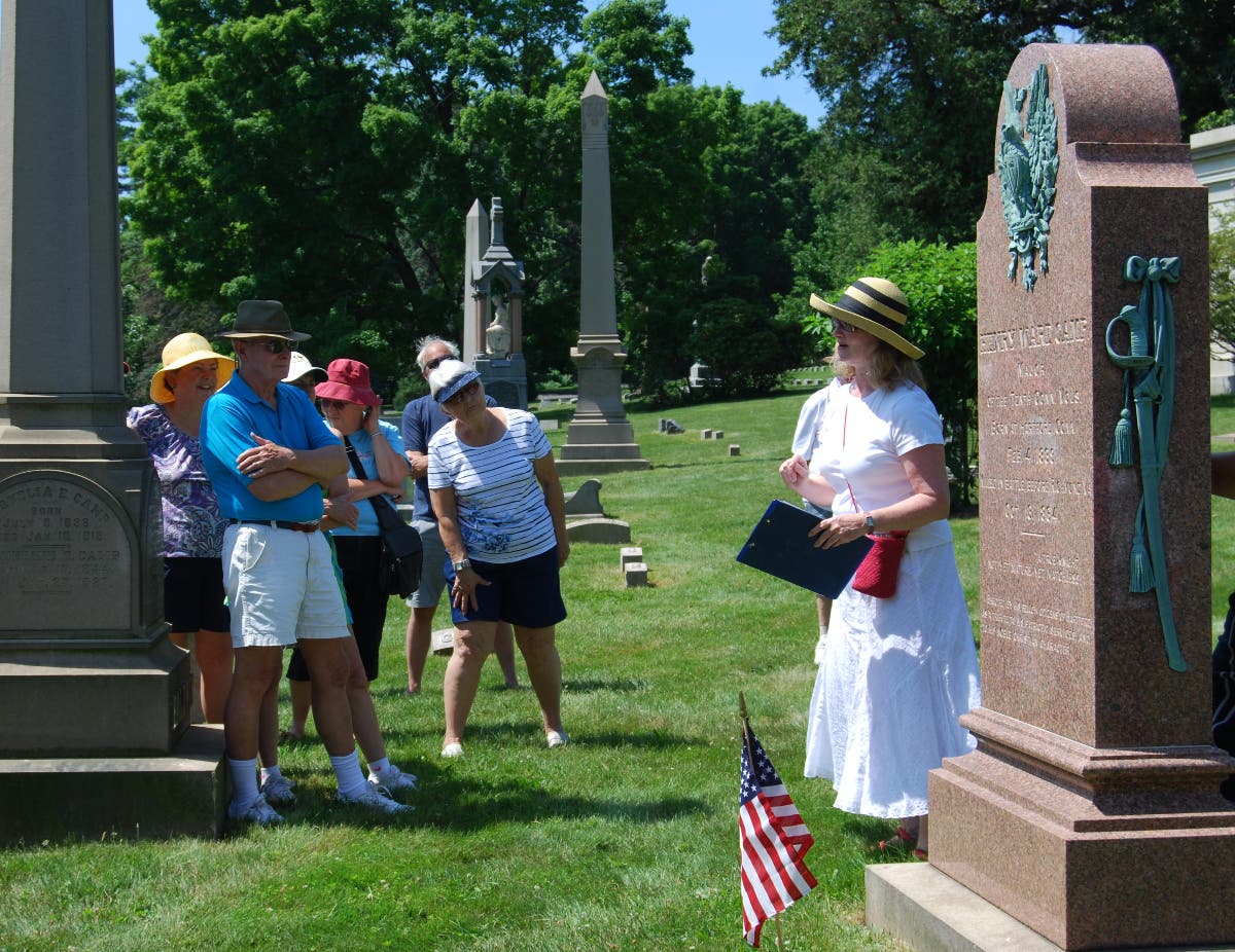 Evelyn Bollert leads a Civil War-themed tour at Cedar Hill Cemetery.