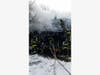 Norwalk firefighters battle a house fire on Kossuth Street.