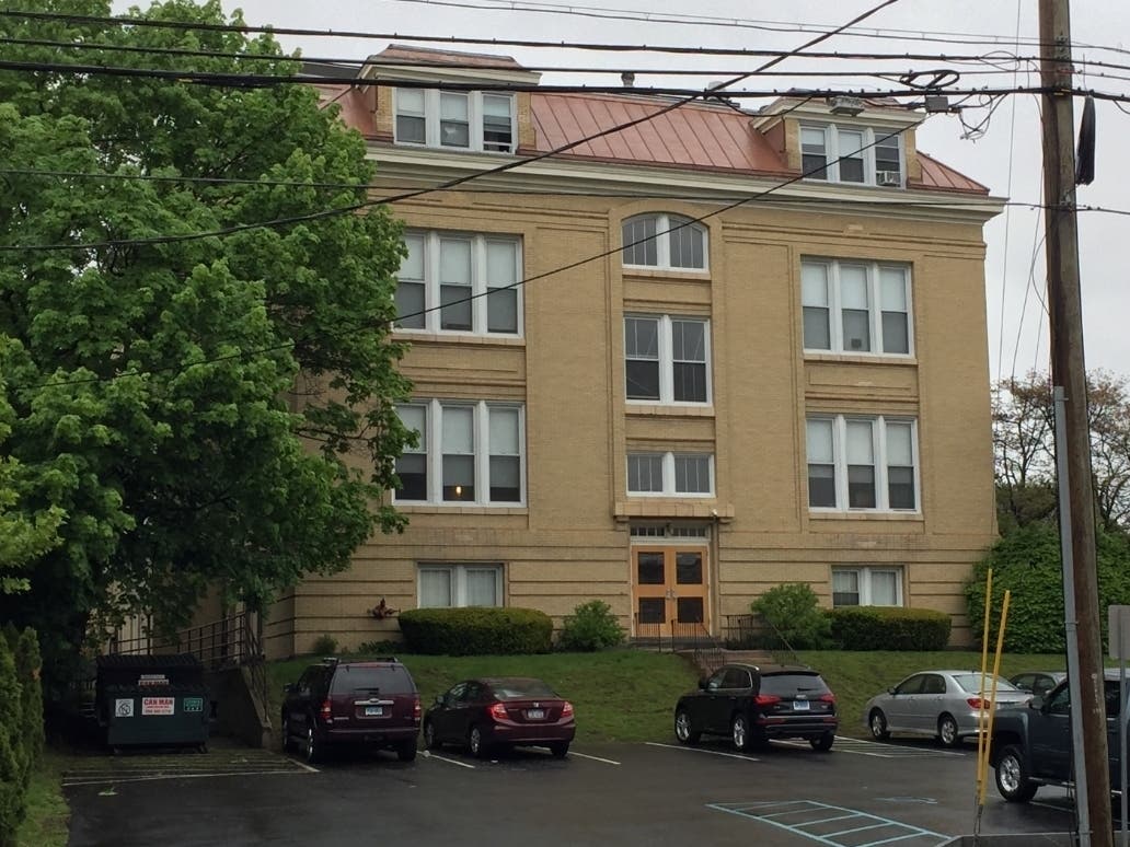 The Town Hall Annex Apartments on Havemeyer Place in Greenwich where a dead baby was found in a dumpster in 1986.