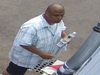 Surveillance photo of the suspect sought by Norwalk police in connection with a stolen vehicle investigation.