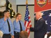 Westport First Selectman Jim Marpe, right, issue the oath of office to new Firefighters Chelsea Curreri, center, and Timothy Izzo.
