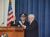Darien Police Chief Don Anderson sworn in by retiring Police Commission Chairman J. Paul Johnson.