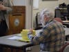 Leonard Ances, one of six official counters, starts the recount.