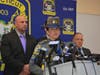 State Police Trooper First Class Christine Jeltema, with members of the State Police Western District Major Crimes Unit, at a press conference about the arrests of Fotis Dulos, Michelle Troconis and Kent Mawhinney.