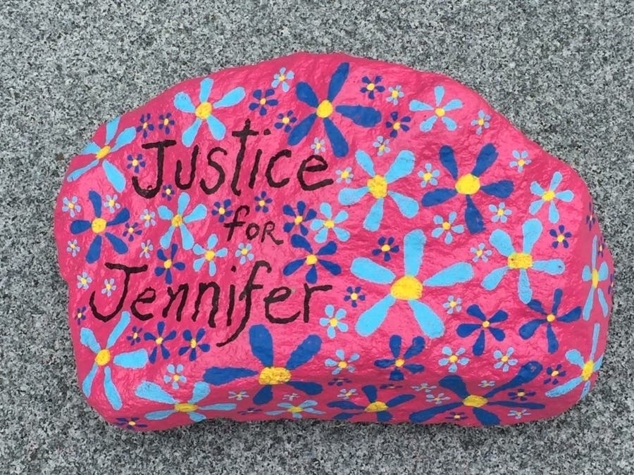 A "Justice for Jennifer" rock, one of several placed around New Canaan, in front of New Canaan Town Hall.