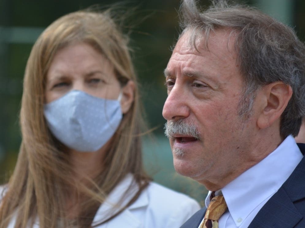 Michelle Troconis, left, and attorney Jon Schoenhorn following a recent court hearing in Stamford.