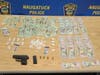 Naugatuck police seized cash, drugs and a firearm from two suspects Friday.