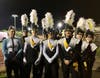 Members of the Trumbull High School Golden Eagle Marching Band. From left, Rachel Bikofsky, Sam Cohen, Noah LaFond (drum major), Sarah Wojtaszek, Kate Vasquez (drum major), Jude Farin, Brooke Formanek, and Amanda DiPinto