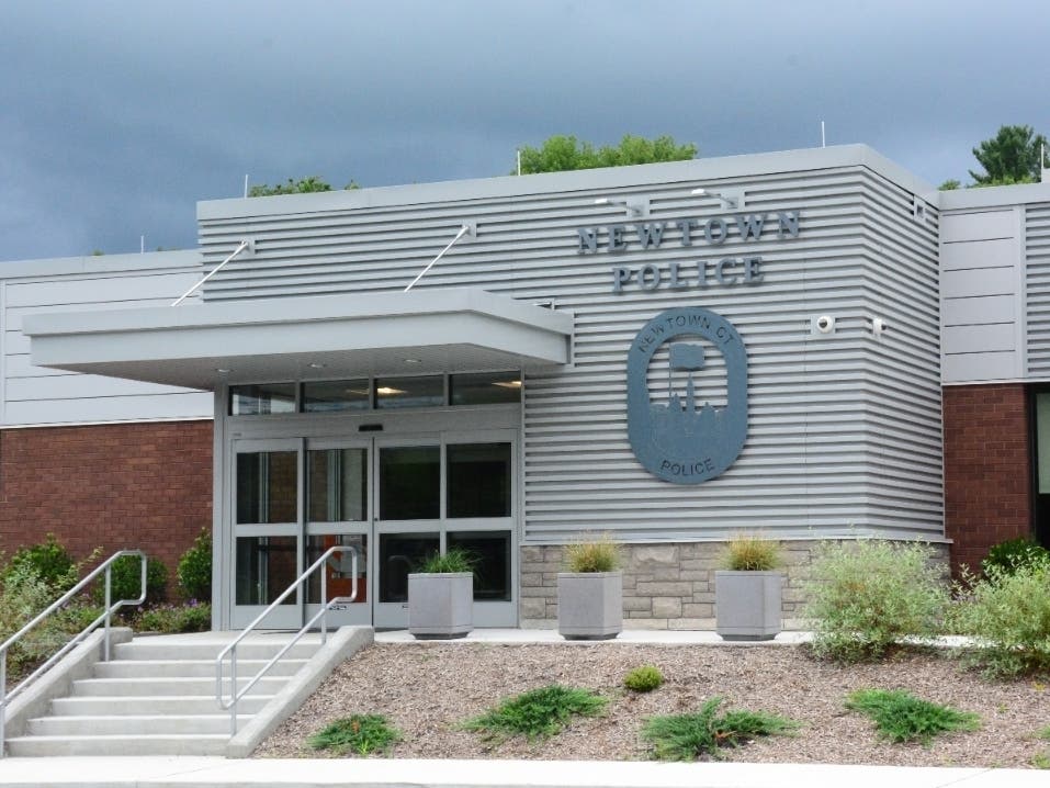 Danbury resident Christopher Lemke was arrested Thursday after Newtown police said he kidnapped a Newtown resident at gunpoint before crashing a stolen car in Southbury.