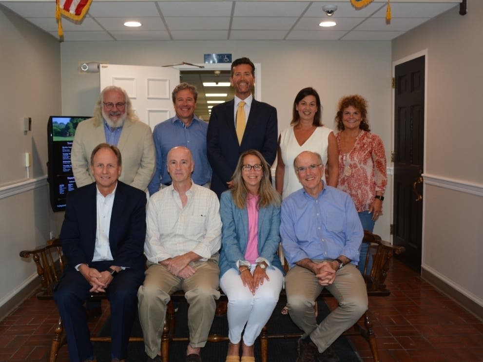 2022 Charter Revision Commission. Seated, L to R, John Mitola; John Wynne; Marlene Battista; Chris Brogan; Standing, L to R, Steven Mednick, counsel; James Baldwin, town attorney; Bryan Cafferelli, Chair; Pamela Iacono; Pru O'Brien, recording secretary.