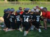 Fairfield American Little League head coach Matt Lawlor and the coaching staff address the players.