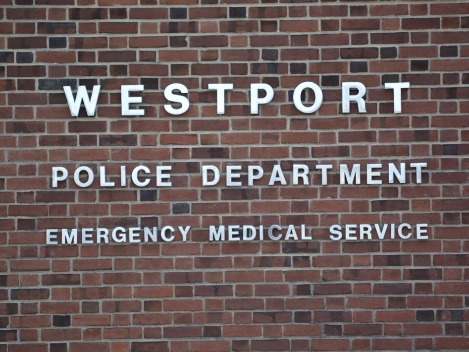 A Massachusetts man was arrested by Westport police this week on identity theft and larceny charges.