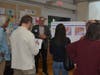 Fairfield Planning Director Jim Wendt listens to residents during Thursday night's Plan of Conservation and Development open house in Fairfield.
