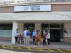 Fairfield Community & Economic Development Director Mark Barnhart cuts the ribbon at the rebranded Black Rock Theater. The venue's Executive Director Connor Deane stands to his left.