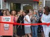 Carol Dannhauser, right, owner of the Fairfield County Story Lab, hugs First Selectwoman Brenda Kupchick at the ribbon-cutting ceremony this week.