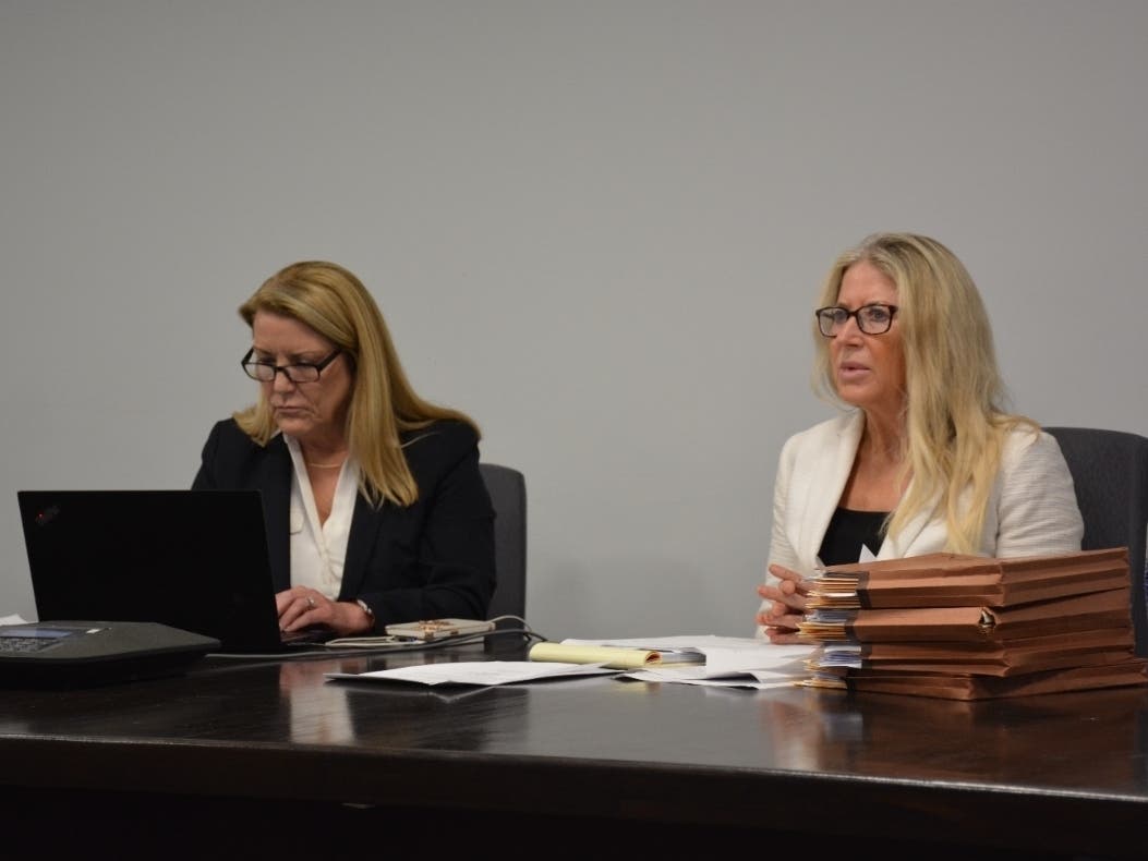 First Selectwoman Brenda Kupchick, left, and Fairfield Human Resources Director Cathleen Simpson during Monday's Board of Selectpersons meeting.