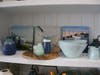 The artwork in the background — for sale at Ocean Blu Boutique in Fairfield — was painted by local artist Susan Fehlinger.