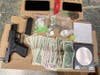 Bridgeport police found a gun, narcotics, cash and other items in the possession of suspect Christian Gilbert, who was arrested Monday.