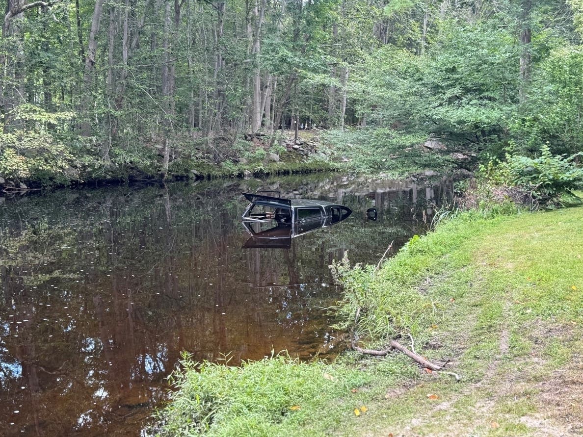Police recovered the body of 59-year-old Weston resident Robert Macisaac from the Aspetuck River on Thursday. He is believed to have crashed his vehicle, pictured, into the river during Sunday's heavy storm, according to Fairfield police.