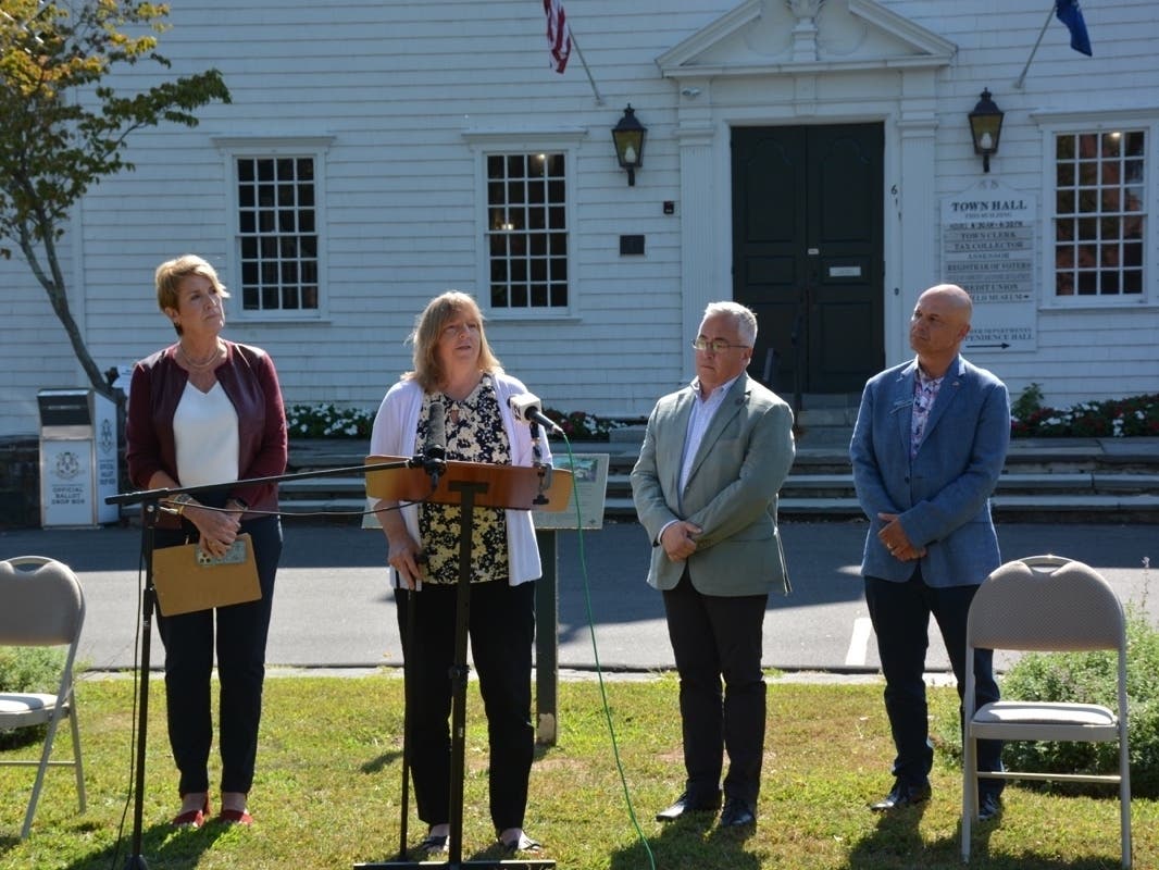 Fairfield Republican Town Committee Chair Laura Devlin, left, and Republican Registrar of Voters Cathy Politi during a news conference Thursday in front of Fairfield Town Hall.