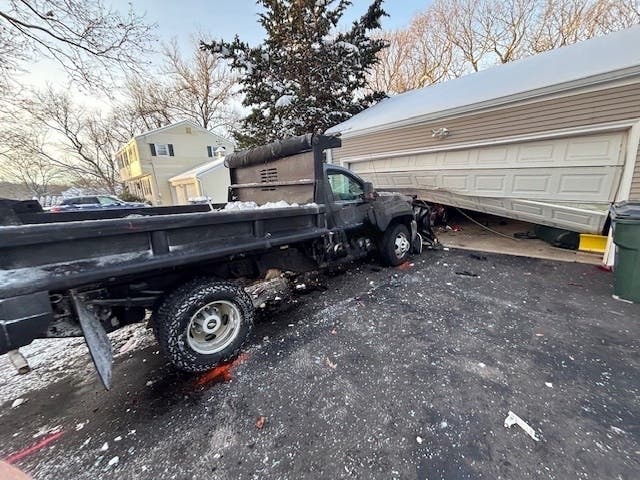 A private snowplow driver was injured Sunday when his truck smashed into houses and vehicles on Glen Ridge Road and Tahmore Drive in Fairfield, according to police.