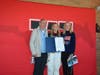 Two-time Olympian Kristen Santos-Griswold, center, and her parents, Rick Santos and Donna Soukup. Santos-Griswold was honored with a town proclamation Tuesday at Fairfield Warde High School.
