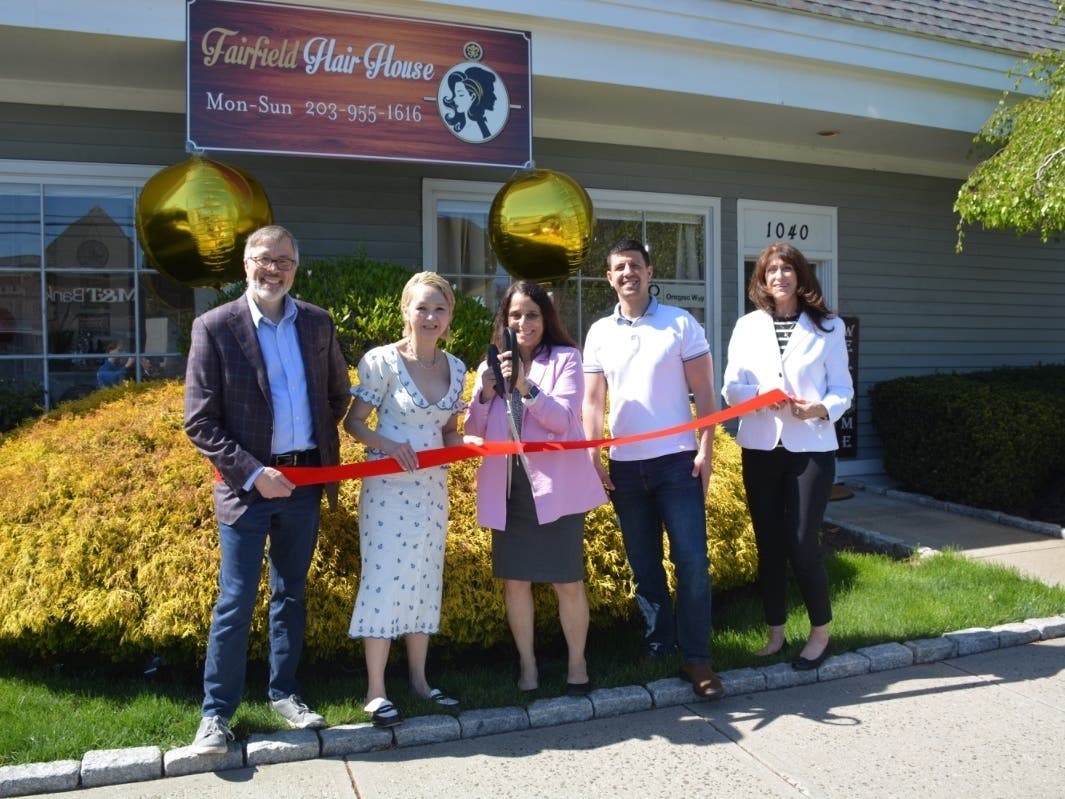 First Selectperson Christine Vitale cuts the ribbon for the new salon in downtown Fairfield, Fairfield Hair House. Owners June Chen and Marco DiVincenzo are on either side of Vitale, and they are joined by Mark Barnhart and Beverly Balaz.