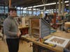 Fairfield Warde student Daniel J. Calandriello and the book barn he is making.
