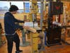 Fairfield Warde student Gabriel Reisinger works on a project using one of the Woodshop's band saws.