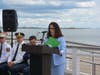 Fairfield First Selectperson Christine Vitale reads a proclamation during Friday's ceremony in honor of Penfield Reef being designated a Vertical Flight Society Heritage Site.