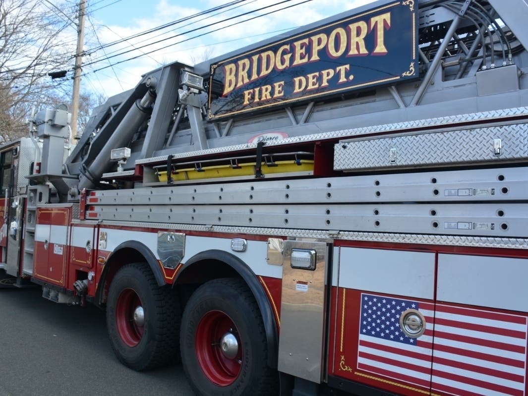 Bridgeport firefighters doused a residential fire on Sunday that displaced 10 people, according to authorities. No injuries were reported.